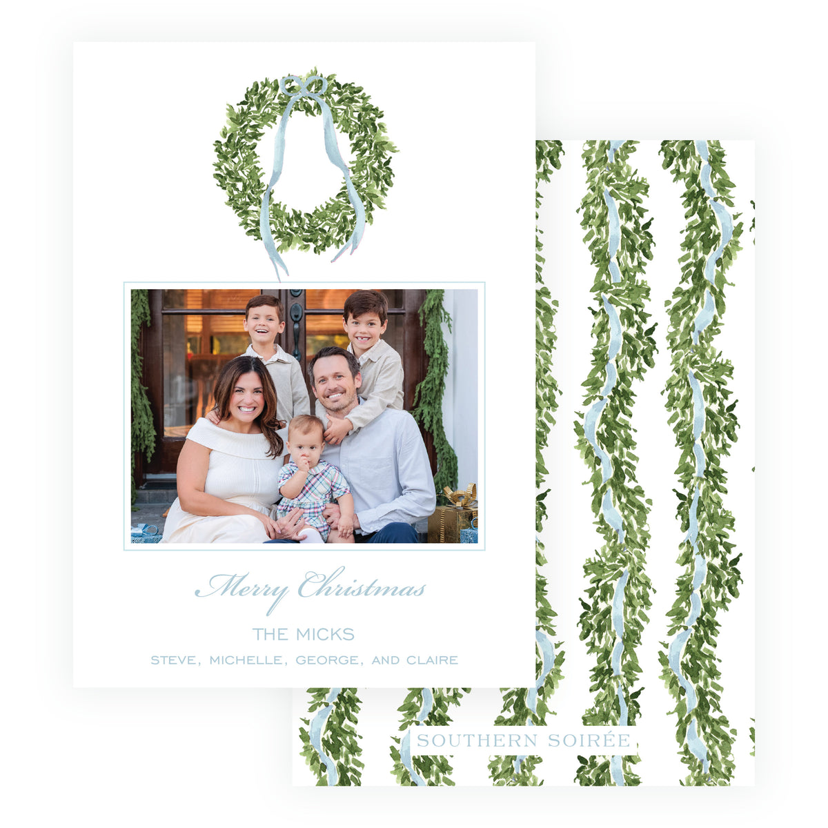 A holiday greeting card and matching back design featuring a green wreath with a pale blue ribbon at the top, a family photo in the center, and vertical green garland motifs with pale blue ribbons on a white background.