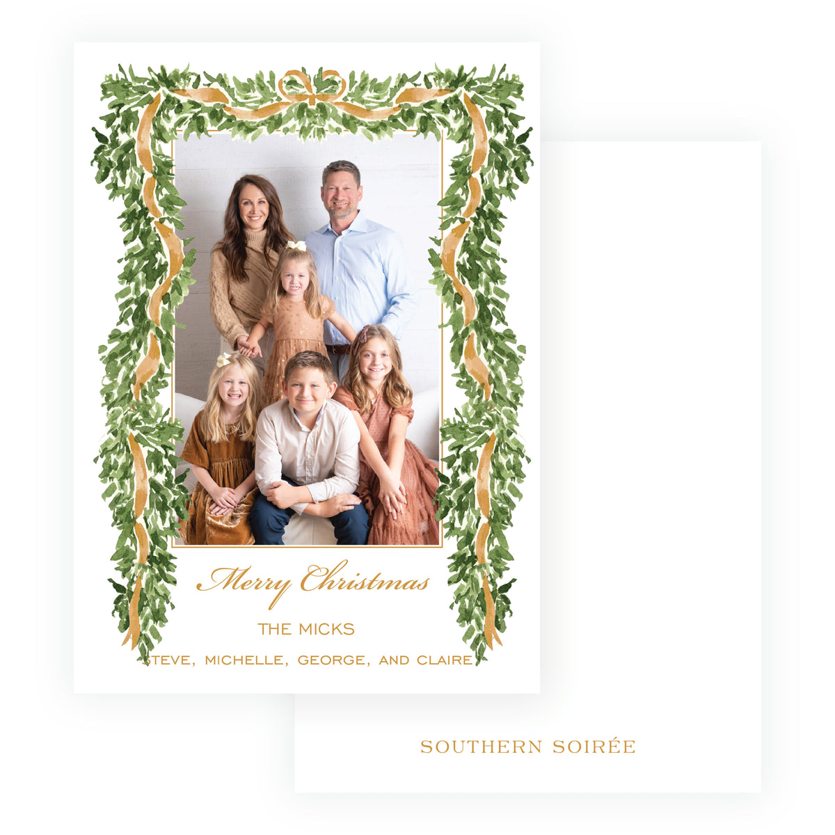 Personalized family Christmas photo card surrounded by greenery and gold. ribbon