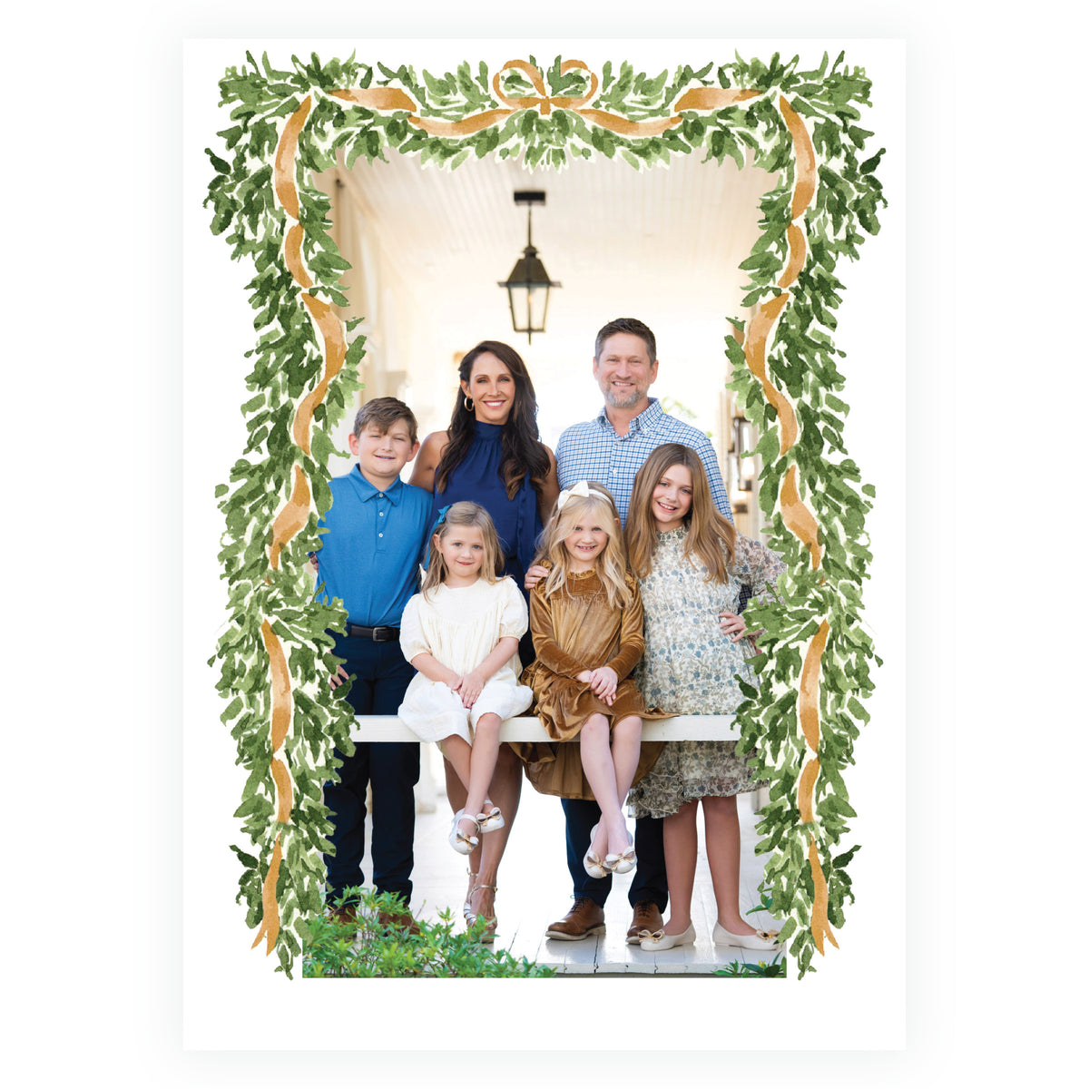 Full frame personalized holiday photo card with greenery and gold accents