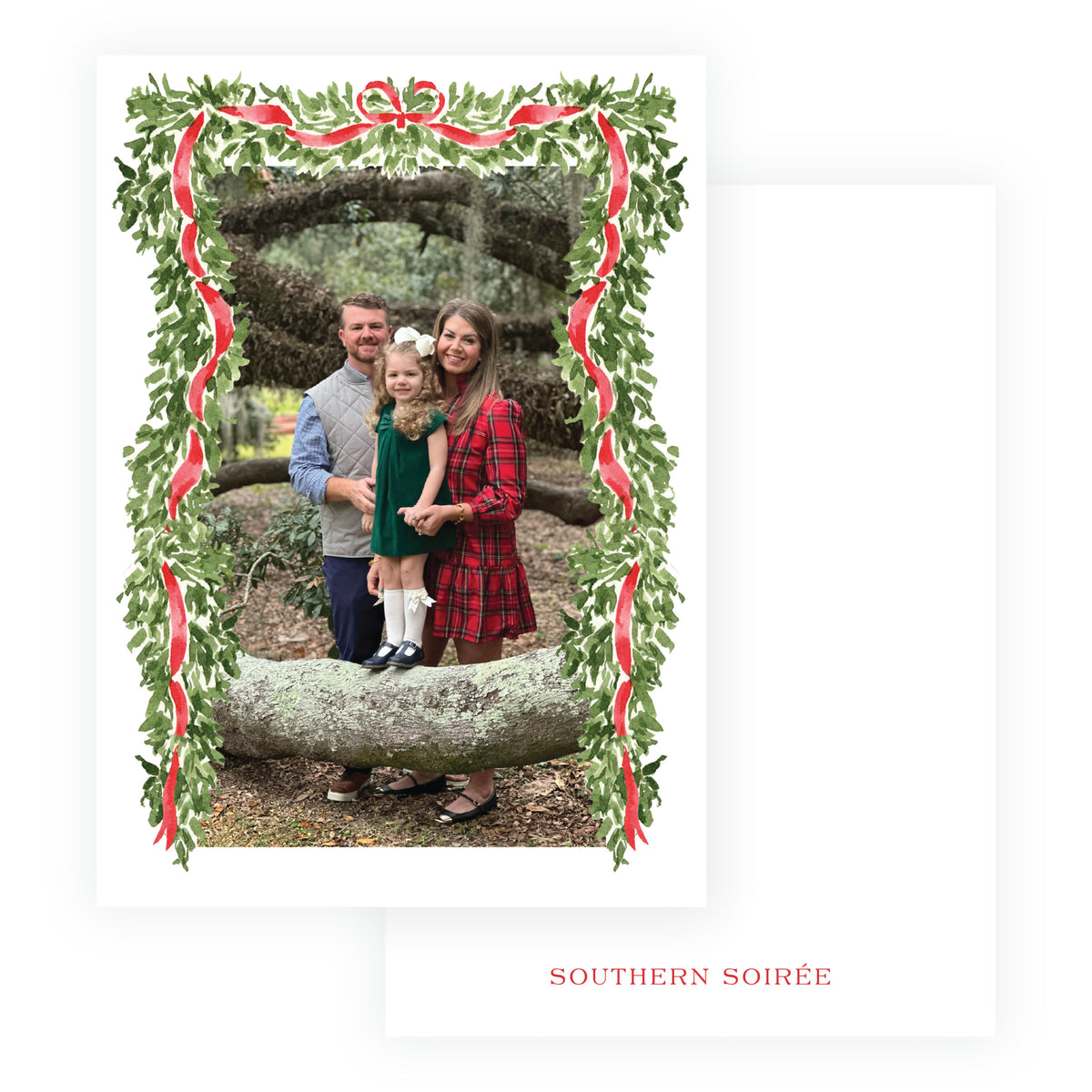 Personalized family holiday photo card surrounded by evergreen garland