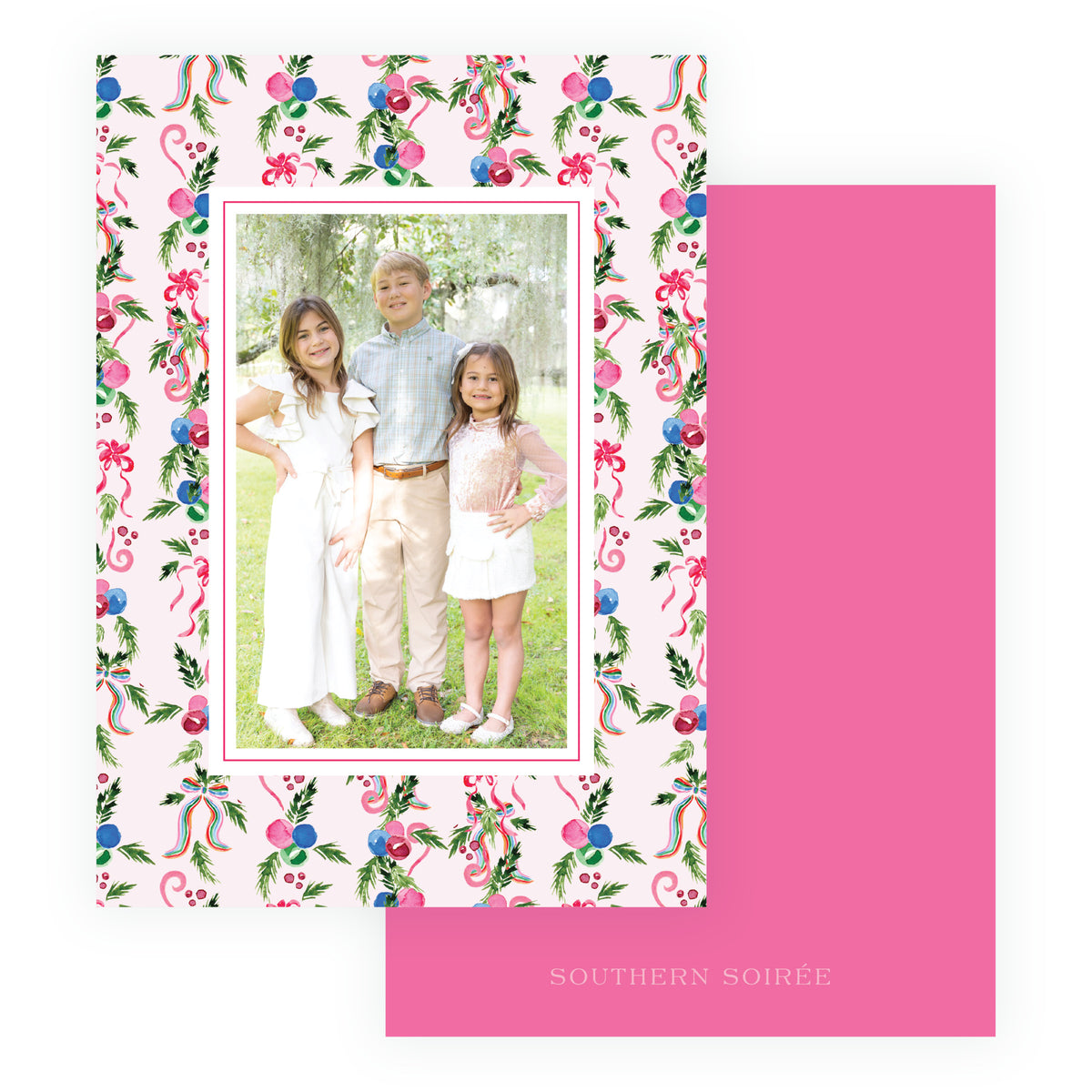 Colorful personalized Christmas photo card with soft pink background and family photo