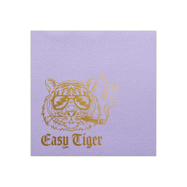 Lavender Easy Tiger cocktail napkin with metallic gold tiger wearing sunglasses and smoking a cigar