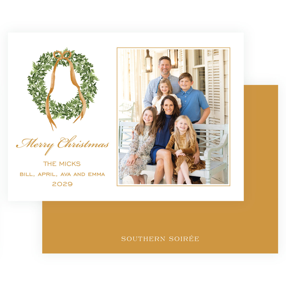 Landscape family Christmas photo card with greenery and gold bow