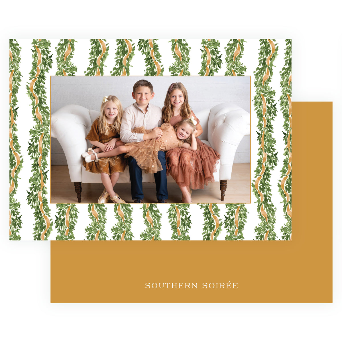 Landscape family Christmas card with repeating evergreen garland and gold ribbon