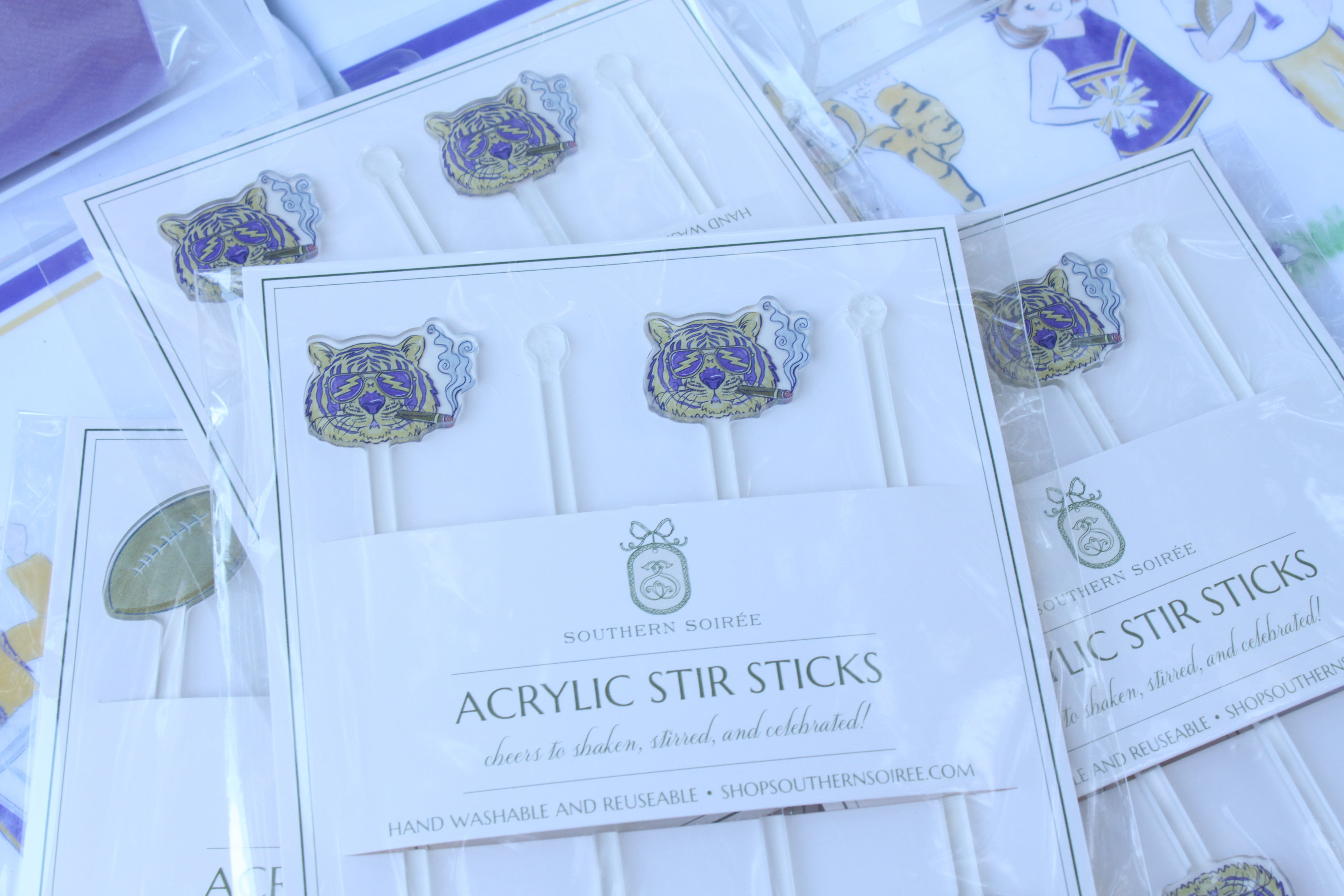 Set of four purple and gold tiger acrylic cocktail stir sticks in Southern Soirée packaging