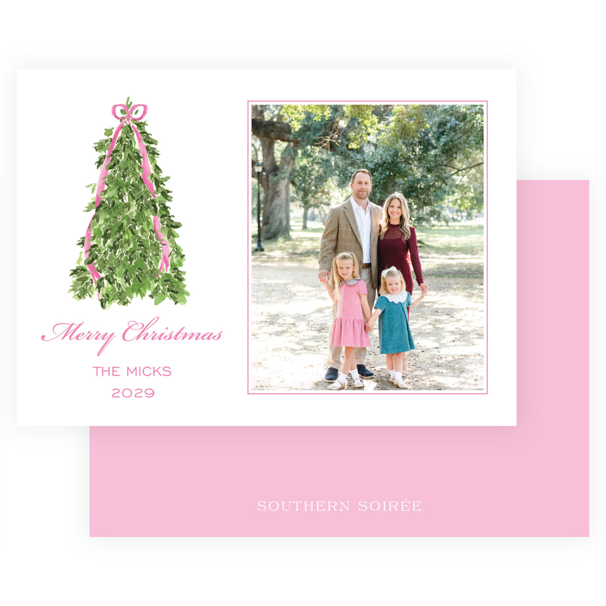 Landscape family Christmas photo card with evergreen tree and pink bow
