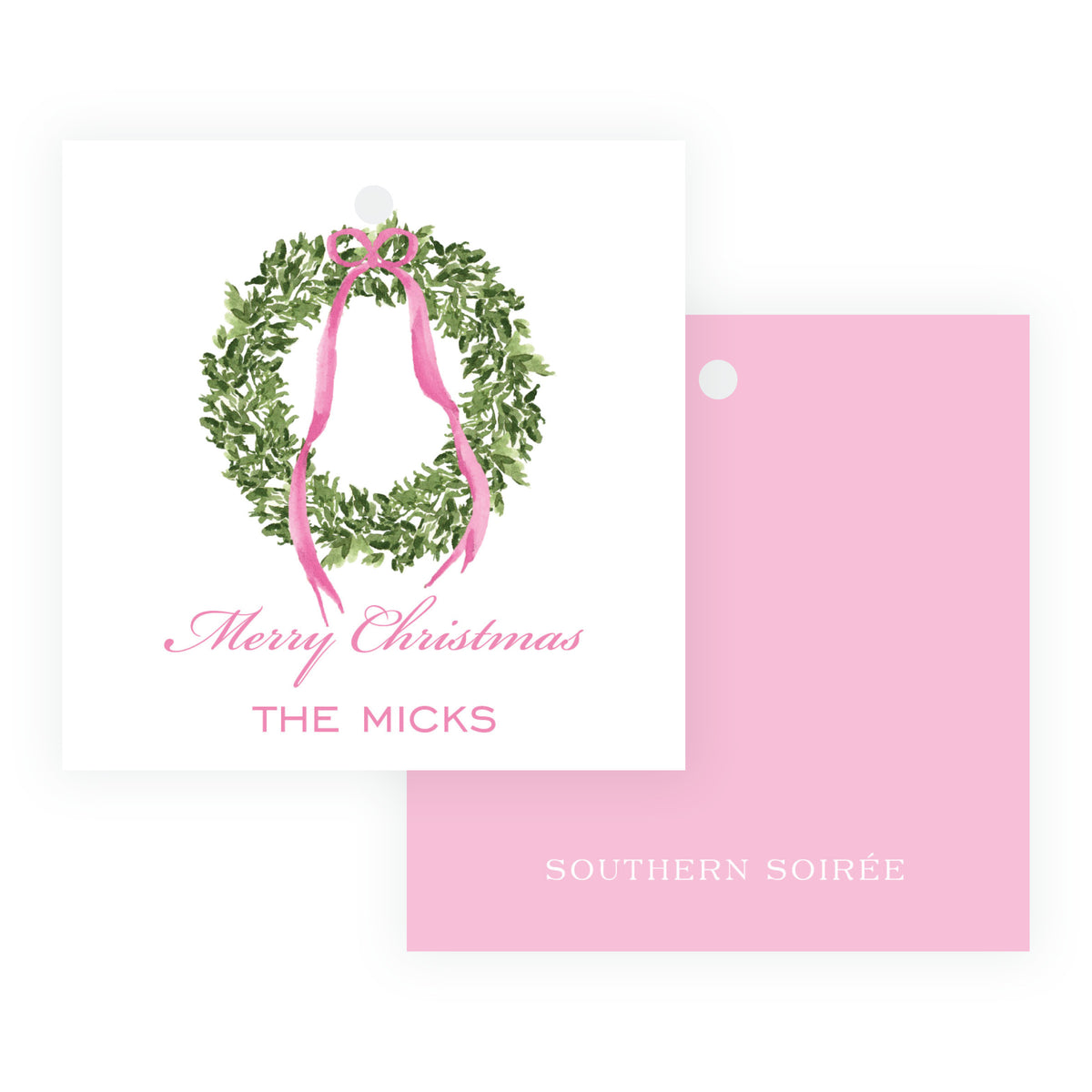 Pink personalized square Christmas gift tag with watercolor wreath, pink ribbon bow, and family name.